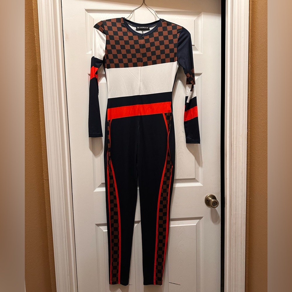 New never been worn Blue and Red Jumpsuits. Size medium